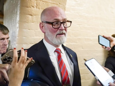U.S. Rep. Derrick Van Orden speaks to reporters while arriving for a Republican caucus meeting at the U.S. Capitol.
