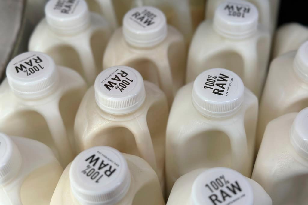 Bottles of raw milk are displayed for sale at a store in Temecula, Calif.