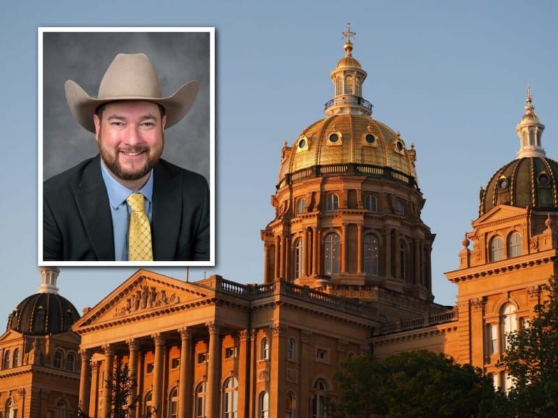 Image of the Iowa state capitol. In the top-left corner, there is a framed inset portrait of Derek Wulf, a smiling man with a beard wearing a cowboy hat and a dark suit.