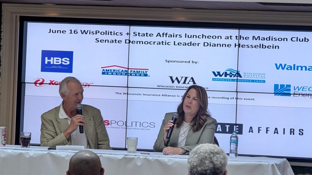 Wisconsin state Senator Dianne Hesselbein sits at a panel table next to WisPolitics President Jeff Mayers.