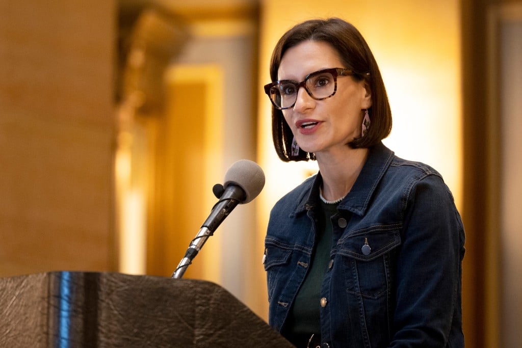 Minnesota Lieutenant Governor Peggy Flanagan speaks into a microphone.