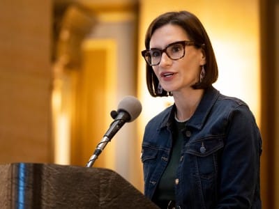 Minnesota Lieutenant Governor Peggy Flanagan speaks into a microphone.