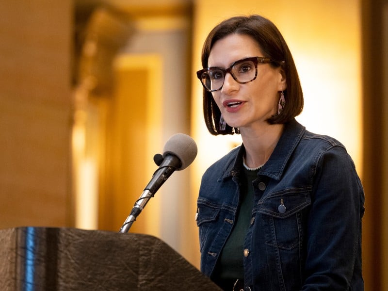 Minnesota Lieutenant Governor Peggy Flanagan speaks into a microphone.