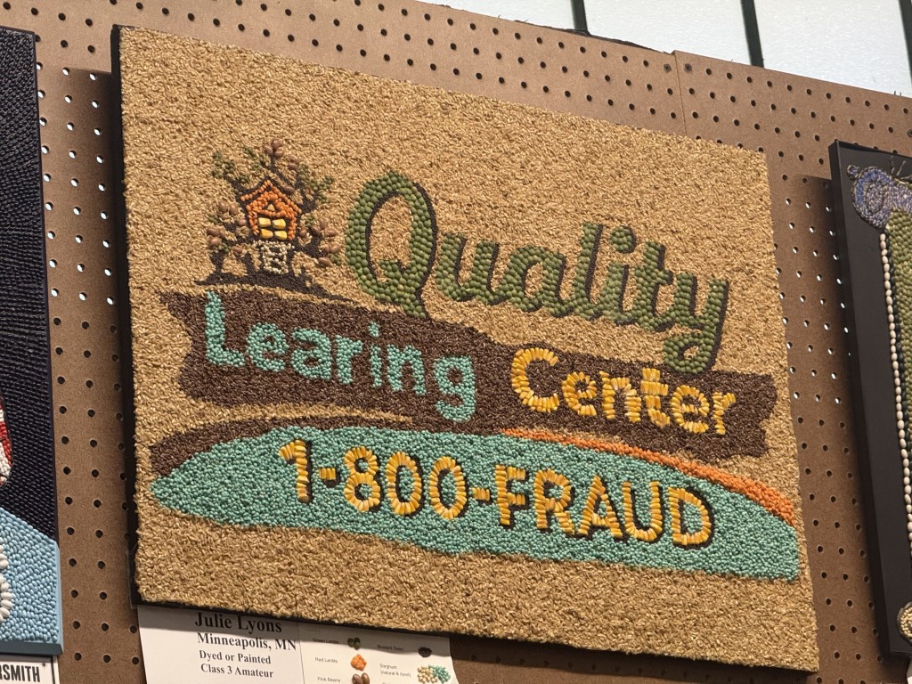 Seed art reading "Quality Learing Center 1-800-FRAUD" beneath a small treehouse illustration.