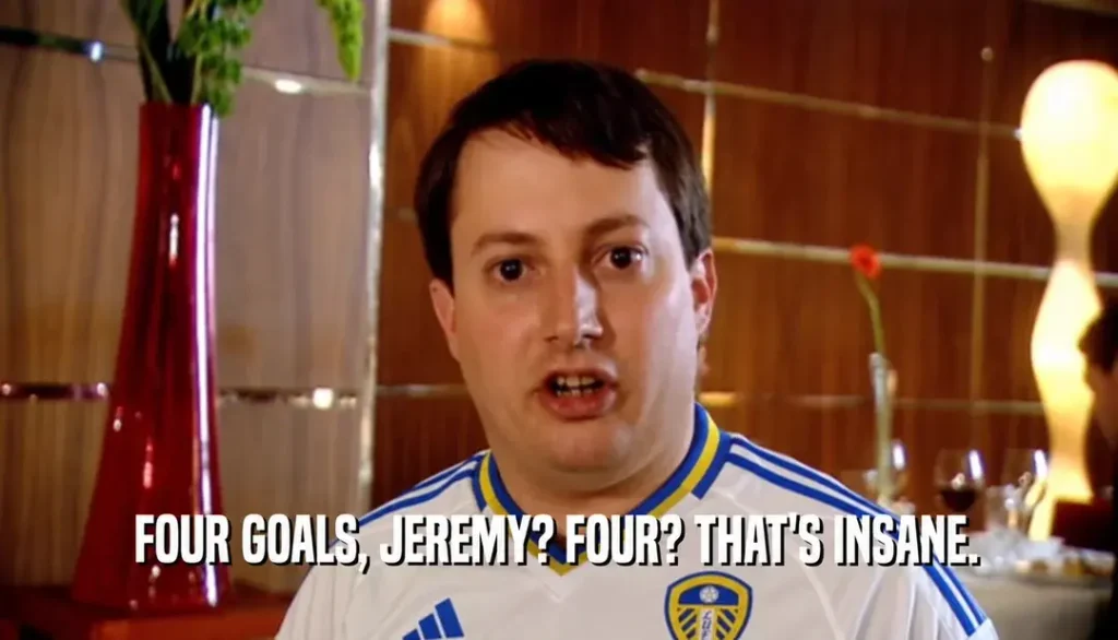 A man in a sports jersey looks shocked. Text overlay: "FOUR GOALS, JEREMY? FOUR? THAT'S INSANE."