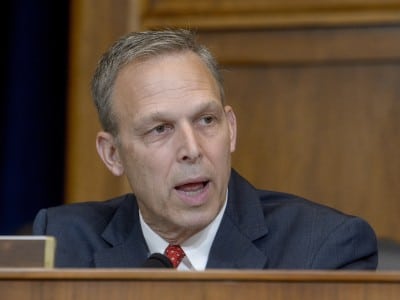 United States Representative Scott Perry speaks into a microphone during a committee hearing