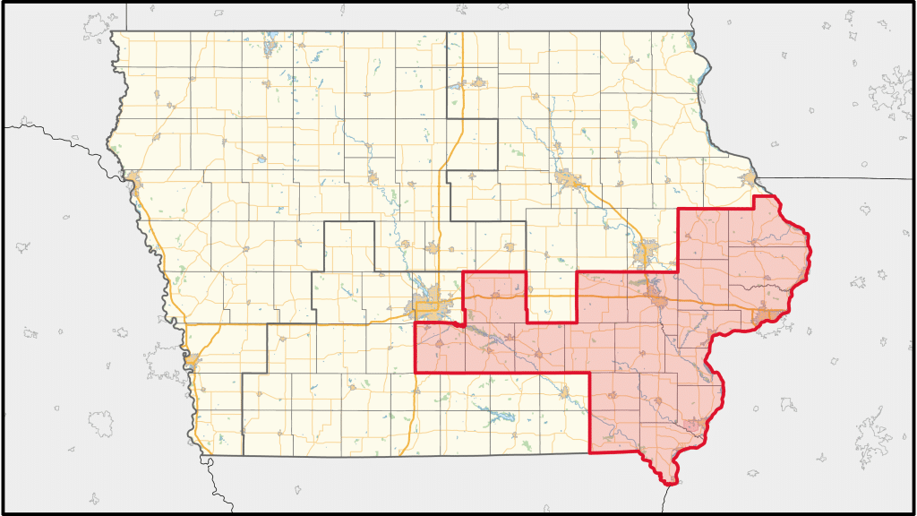 Graphic showing a map of Iowa (in light yellow) with the 1st Congressional District in the southeast highlighted in red