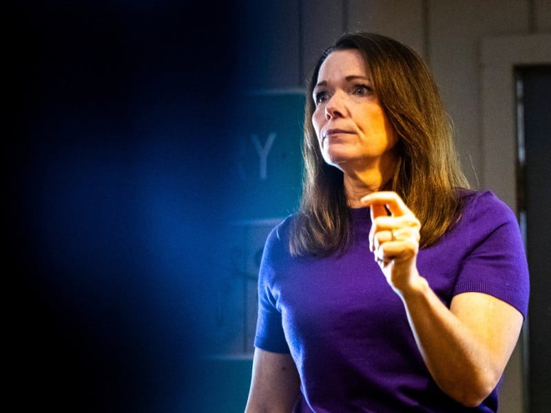Christina Bohannan gestures with one hand while speaking, looking off to the side.